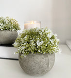 Faux White and Green Plant in a Grey Pot